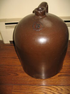 American pottery jug with dark brown iron oxide glaze c 1850 $200-$100