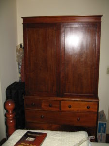 Cherry linen press w 2 highly figured side panel doors over 2 drawers $5,500-$2,750