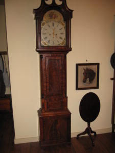 Scotland tall case clock with mahogany veneer $4,250-$1,500
