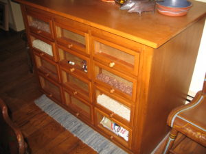 Tom $250 General store counter 12 drawer false glass front bean counter